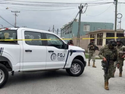 Mexican Navy officers secure the scene of a clash with Gulf Cartel gunmen in Tamaulipas. (