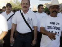 El Tilin (hat) walks with cartel boss El Abuelo. Credit: Breitbart News Foundation / Carte
